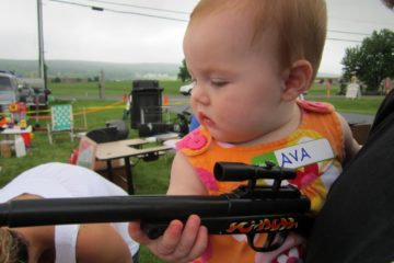 Ava holding a toy Gun